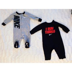 2 baby Nike onesie